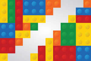 Multicolored LEGO blocks aranged into a pattern, similar to LEGO blocks used for the LEGO Crew JR. at the Provo Library.