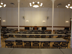 Chairs at long desks in a classroom style setup in the ballroom at the Provo City Library