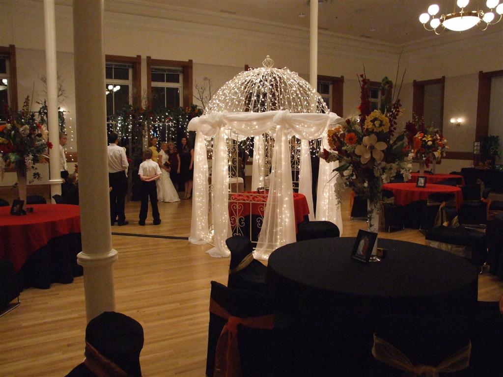 An indoor gazebo decorated with lights in the ballroom at Provo Library
